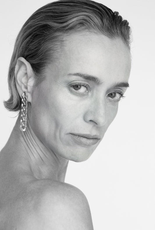 chain drop earrings worn modern sculptural look
