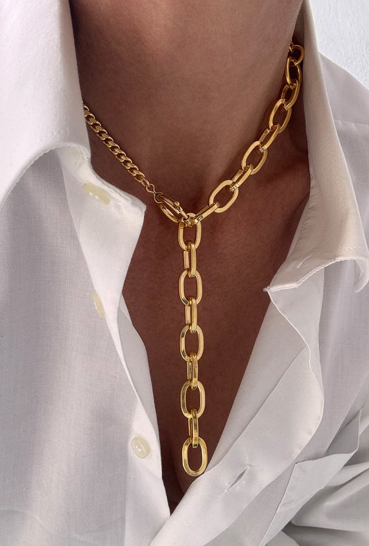 triple gold chain necklace worn sculptural statement look