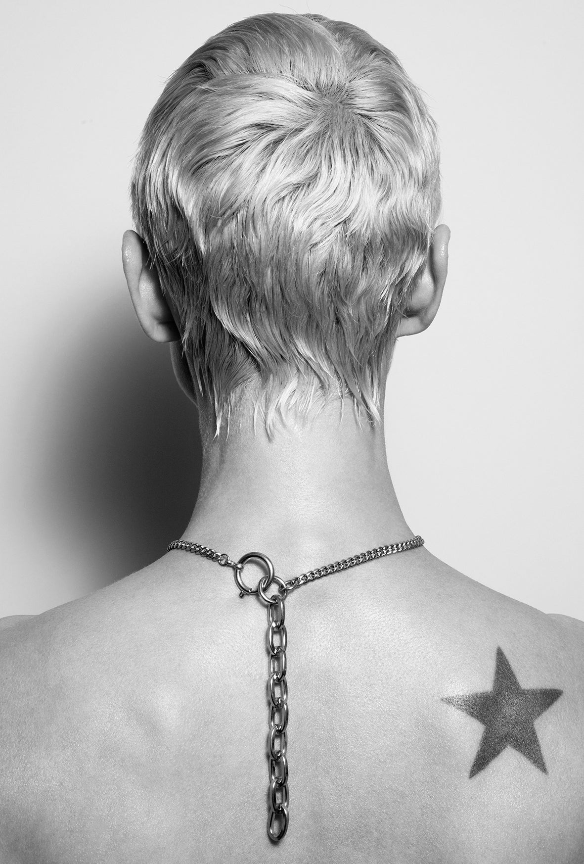 silver chain necklace worn sculptural statement look